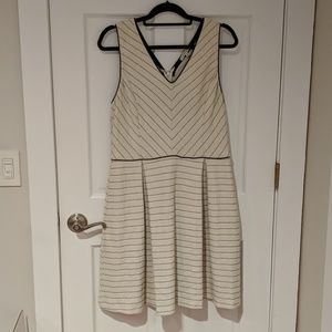 V neck white and black dress with leather trim